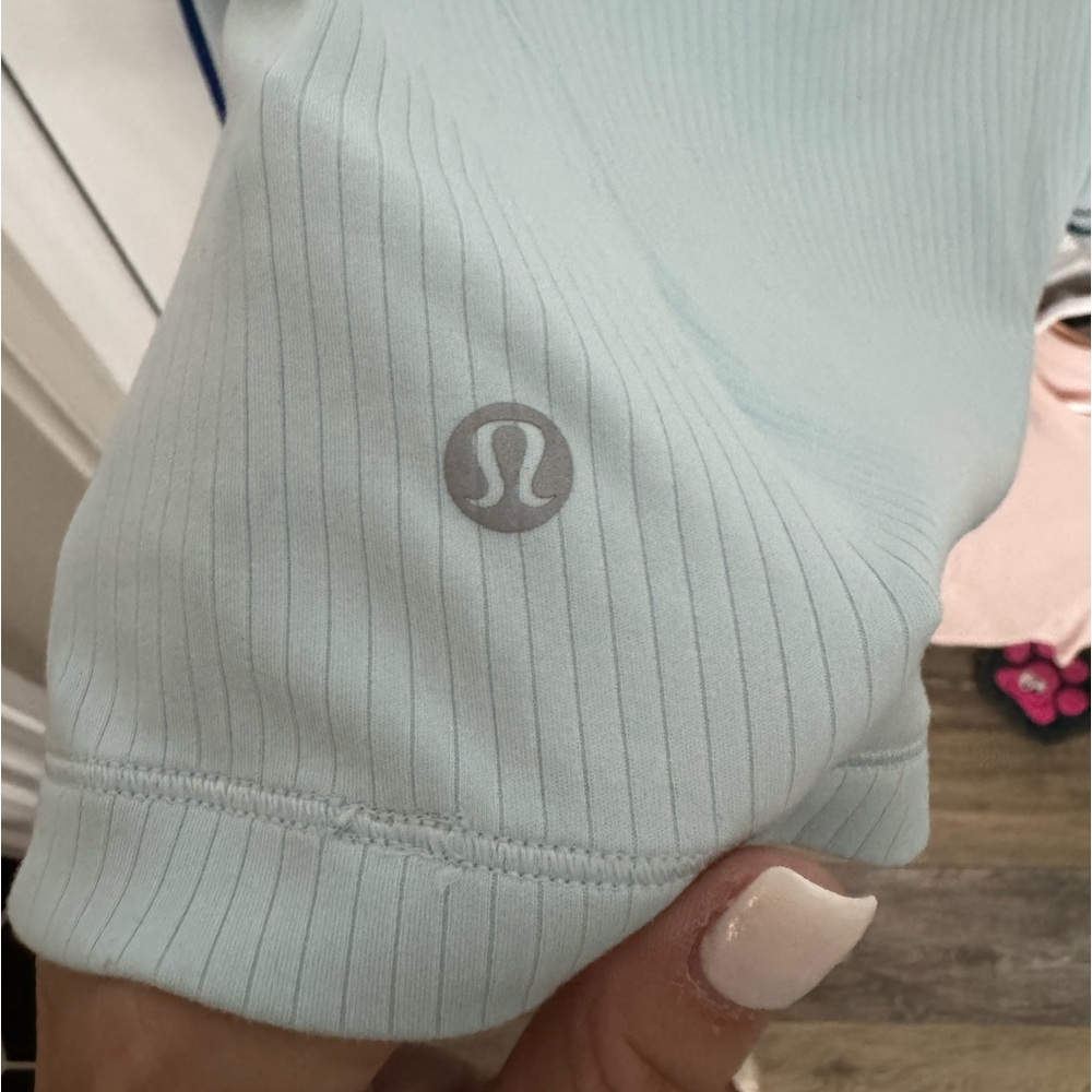 LULULEMON size 4 long sleeve light blue thicker shirt